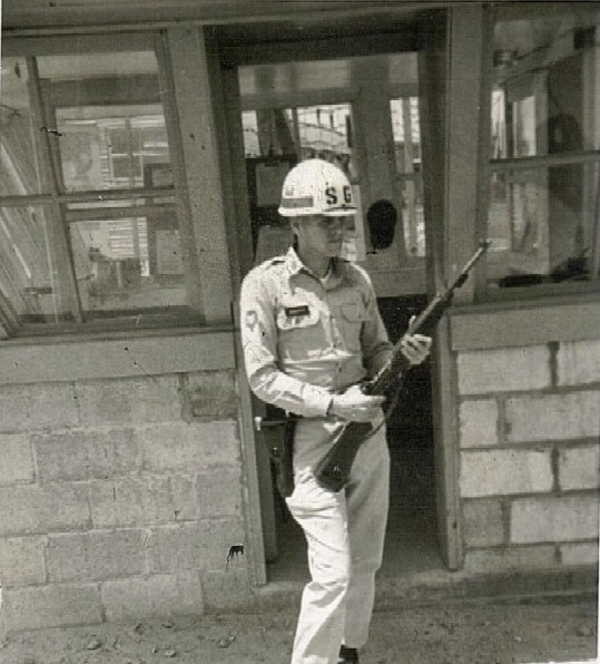 Sp-4 James Roberts on guard duty at Camp Richmond
