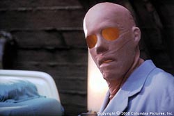 With the latex mask on, Sabastian Caine (Kevin Bacon) appears to be hollow. ''Hollow Man!'' Get it???