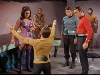 Kirk kneels before female aliens