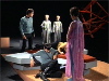 McCoy, Vians standing; Kirk and Spock asleep