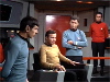 Krik, Spock, McCoy, and Scotty on bridge
