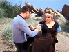 McCoy treats Eleen's arm