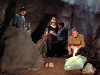 Kirk, etc. around fire in cave