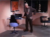 Cogley stands next to computer