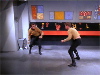 Long shot of Kirk and Finney fighting