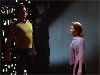Dr. Lester looks at Kirk against wall